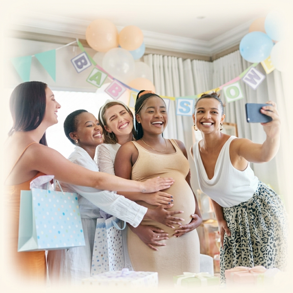 A group of mums taking a baby shower photo to share on social media